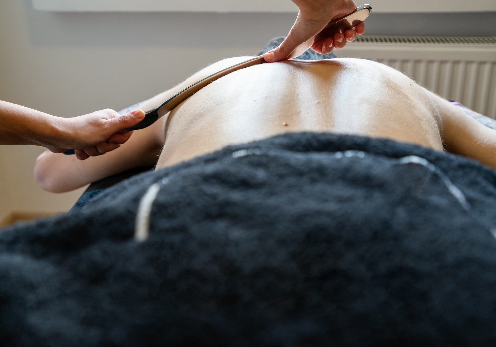 an image of a patient receiving soft tissue therapy